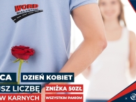 dzień kobiet, zniżka 50 zł na szkolenie anulujące liczbę punktów karnych o 6, na obrazku mężczyzna stojący przed kobietą trzyma za plecami ukrytą czerwoną różę